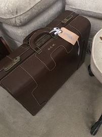 great old working briefcase. large leather with gold intials
