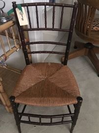 metal faux bamboo chair. great woven bottom. very unique.