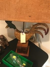 old carved wooden rooster on a block turned into a wonderful lamp with a burlap shade