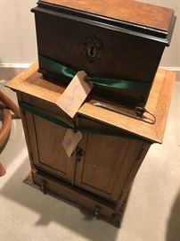 great antique box on top of a small antique chest