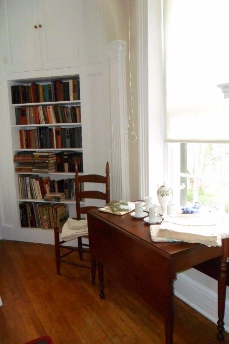 Antique Drop Side Table,Antique Ladder Back High Chair, rush seat. Linens,Books. Tea Set.
