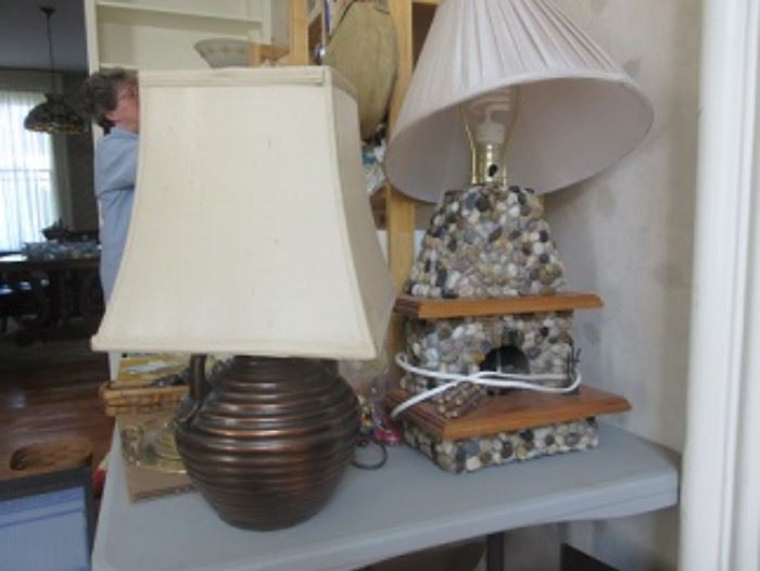 Lamp on the right is a fireplace and the fire area lights. The lamp on the left is a bean pot lamp. There are over 20 lamps .