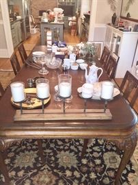 Antique dining table and the 6 chairs being sold separate