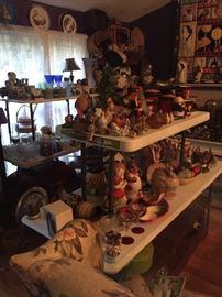 lots of decorative roosters, cookies jars, and bowls