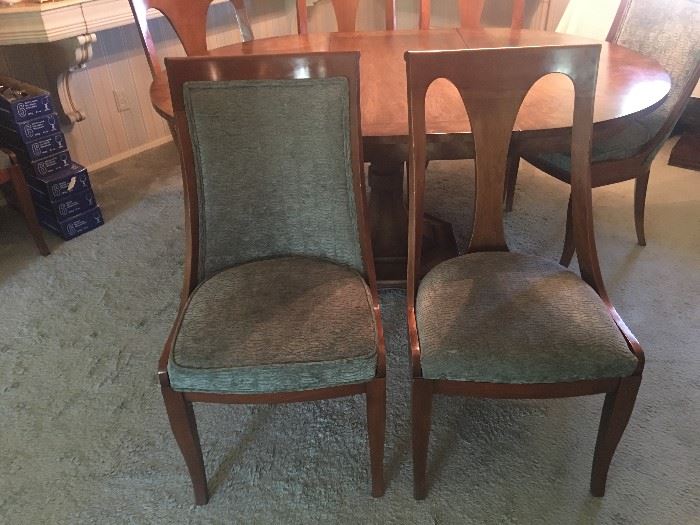 Chairs to dining set.  Two solid fabric covered chairs and 4 open back chairs.