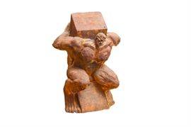 Jesus Lizaso Cast Composite Concrete and Sand Sculpture: An original carved cast composite concrete and sand sculpture by Jesus Lizaso (Spanish b. 1961) Barcelona sculptor. It depicts a muscular man with a pained expression; he is bent over and burdened with a large block on his back. The proportions of the figure are deliberately distorted, in particular, his enormous feet and very small head. The sculpture has been painted in in rust tones.