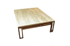 Travertine Stone and Metal Coffee Table: A travertine stone and metal coffee table. This rectangular table features a stone top with beveled edge resting on a metal frame. The frame includes apron sides and rectangular frame design legs and it has a painted finish.