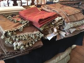 Incredible selection of decorator fabrics.  Valances with tassles