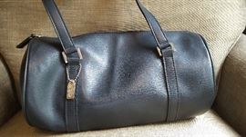 Coach look purse. Unique round styling.