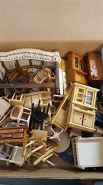 boxes of vintage and modern doll furniture