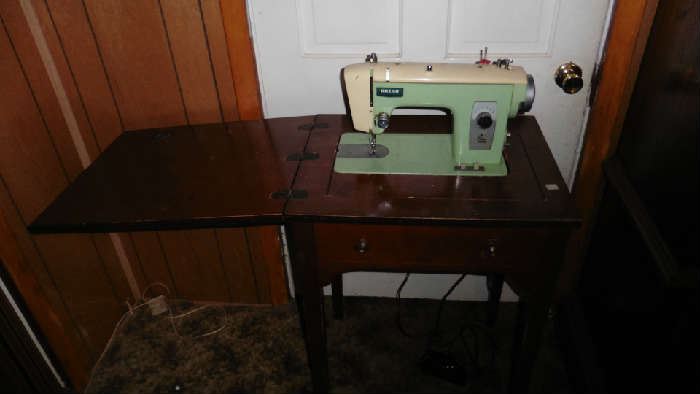 Riccar sewing machine in cabinet