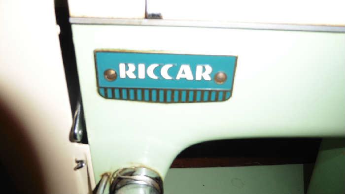 Riccar sewing machine in cabinet