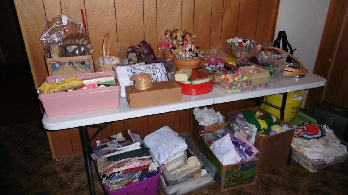 A lot of sewing, quilting, material, dowels at this sale