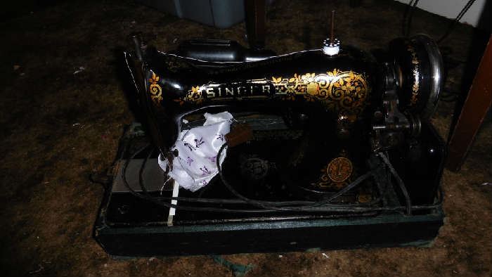 Antique Singer sewing machine in carrying case