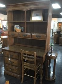 We have 2 desks with upper separate pieces to store books, memorabilia, glasses, etc.