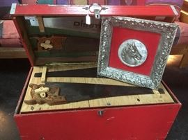 The "saw chest" was sold earlier today, but the framed horse wall piece is still available.