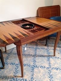 Versatile game table has several different tops