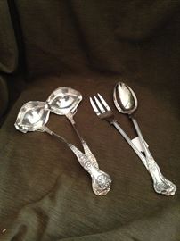 Some of the many sterling serving utensils