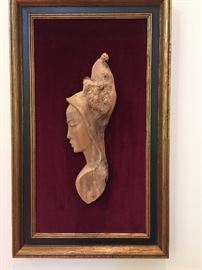 Mounted carved wood relief portrait