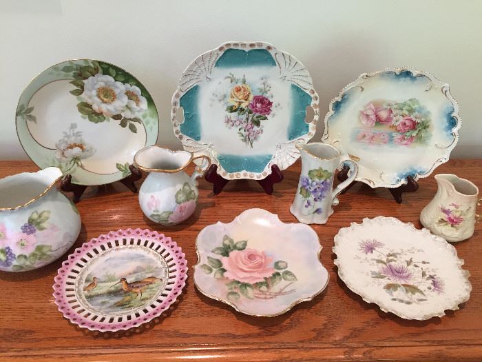 Sample of many antique pieces of hand painted and transferware china
