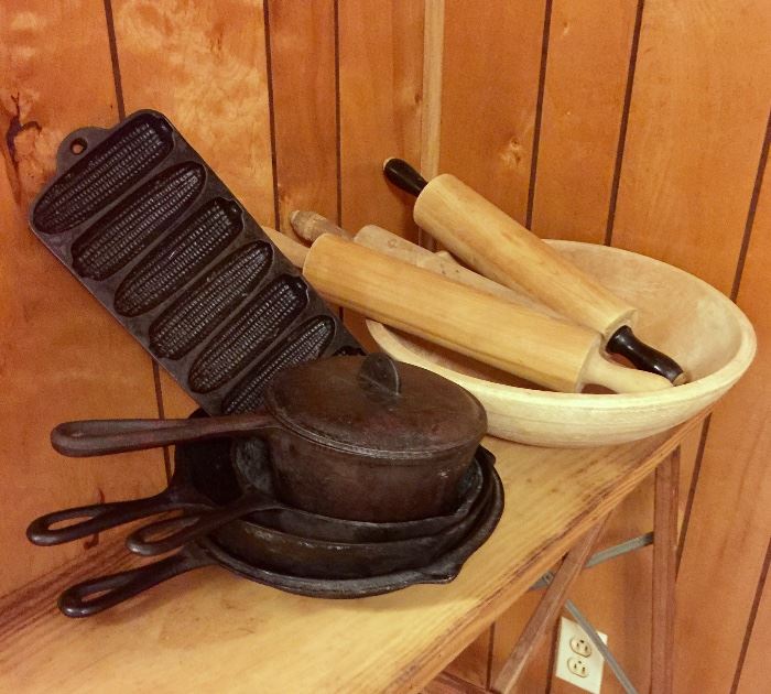 Cast iron, wood ironing board, and primitive kitchenware