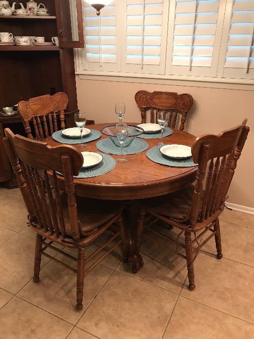 Solid Oak Pedestal Dining Table and Pressed Back Oak Chairs.