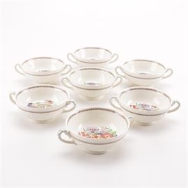 Wedgwood Patrician 'Windermere" Bouillon Cups: A set of Wedgwood Patrician Windermere bouillon cups. The earthenware pieces are decorated with a hand colored transfer printed pattern with relief molding. There are brown printed factory marks on the underside reading "Windermere Wedgwood Patrician Made in England".