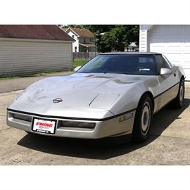 Silver Tone 1986 Chevrolet Corvette: A silver tone 1986 Chevrolet Corvette; VIN is 1G1YY0788G5115040 and odometer reads 55,171.2 miles. Features of this coupe include a 350ci Crossfire engine with 60-pound injectors and a removable hard top which can be stored in the back of the car.