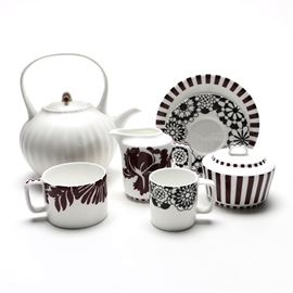 Porcelain Teapot With Tableware Including Donna Karan for Lenox: A porcelain teapot with tableware. There are seven pieces in this lot with a Lenox Donna Karan porcelain teapot and dishes by Richard Ginori in the Claret Missoni Home style with black and white stripes and flowers.