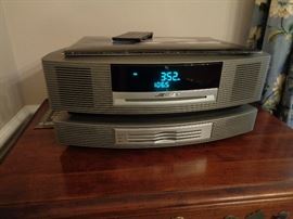 Bose Wave Radio, Brand new condition, AM/FM/CD with additional 3 disk changer, original owners manual and two remotes, sounds amazing , true testament to superior Bose quality.