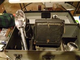 Vintage film camera with slave flash and many accessories, with original carry case.