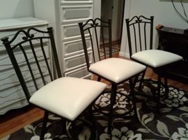 SET OF 3 WROUGHT IRON SWIVEL STOOLS