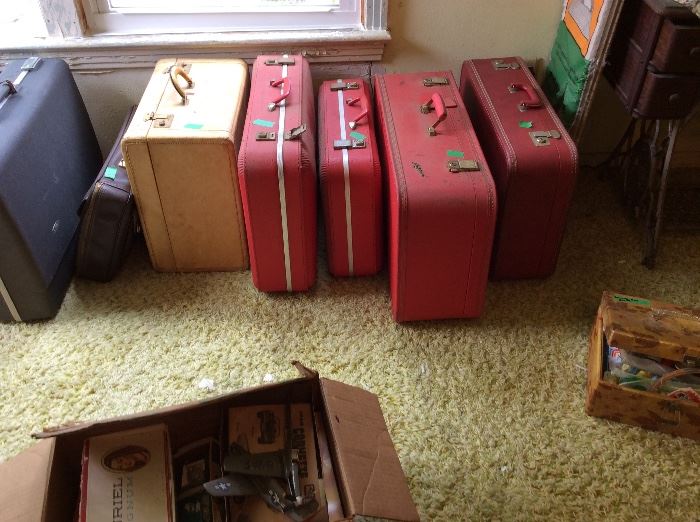 Upstairs - vintage & newer suitcases