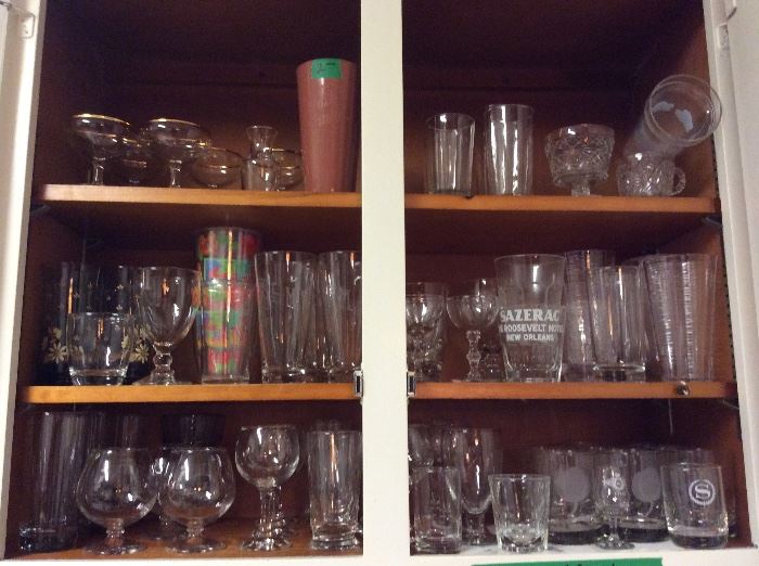 Various glasses in kitchen cabinet