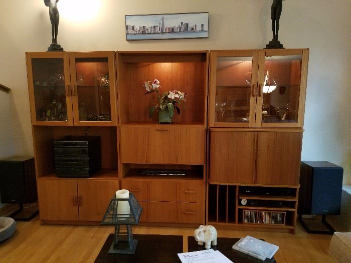 Great 3 piece entertainment center  with desk and so much storage....figures on top of the cabinet are not for sale