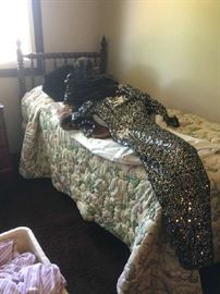 Antique Jenny Lind style pair of twin beds, and a lovely bedazzled sequined evening gown to boot