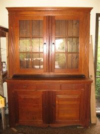 Large walnut two piece hutch made of doors from Armbruster Farm. Absolutely gorgeous!
