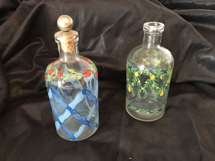 two hand painted floral bottles 