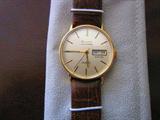 1971 Bulova Accutron Day Timer. Excellent Condition! 14K Gold Case (N9) raised Crystal, Leather Band. One of the last Accutron Models Prior to Bulova Closing their Swiss Factory!