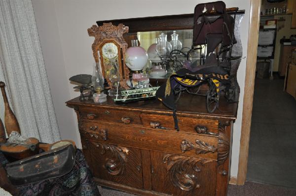 Beautiful carved hutch, clock, toy ship, doll carriage