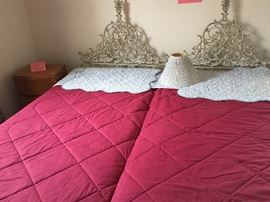 White iron work head boards.  mattresses, boxes and frame sold
