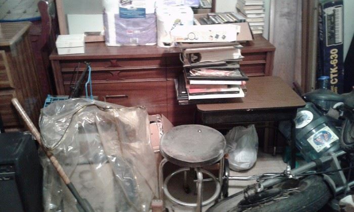 chest of drawers,roll top desk, collection of lots of books,typewriter,