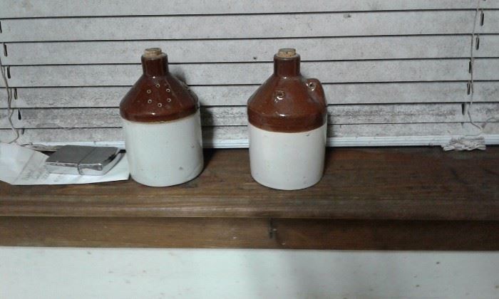 several old jugs and crocks