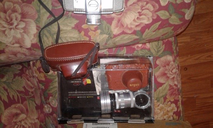 over 15 old cameras in his collections, 
