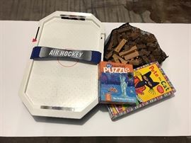 Air Hockey, wooden building blocks, and puzzles