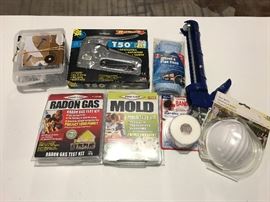 Household goods - radon gas test kit, mold test kit, staple gun, nails, caulking gun and more
