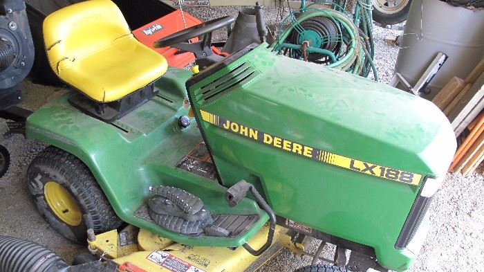 John Deere rider with 17hp. Kawaski. I will get the year next time I go there.