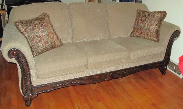 Hughes Furn. Co. carved wood front sofa. 3 years old.