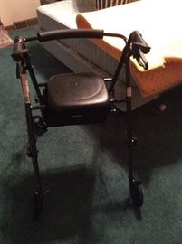 Medical rollator walker with brakes and seat