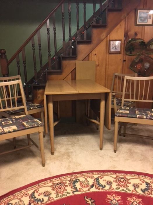 Mid-century with both sides down.  Also has a leaf 
